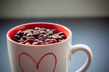 cup of coffee with beans
