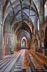Fototapeta premium Worcester Cathedral, northern side Aisle, with empty seating arranged,Worcester,England,UK.