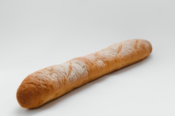 Fresh traditional french baguette isolated on white background