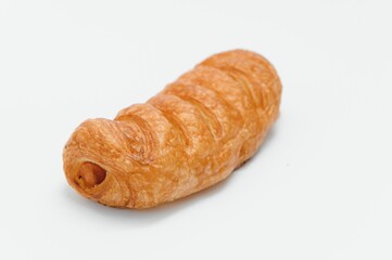Sausage in dough .Isolated on white background