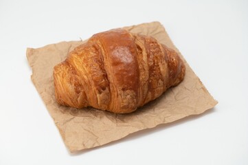 fresh croissant on white background
