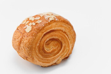 fresh baked croissant isolated on white background