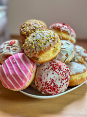  Multicolored Donuts on Plate Close-up