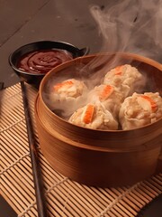 chicken and shrimp dim sum with crab stick topping