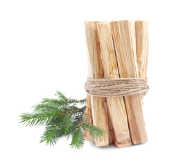 Palo Santo sticks and fir tree branch on white background