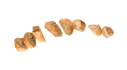 Freshly baked baguette. Pieces of bread in air on white background