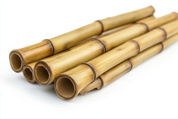 Bamboo tubes arranged artistically on a white background for crafts and decoration