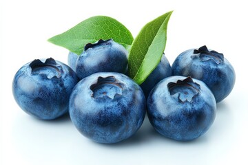 Fresh blueberries with green leaves displayed on a white background in natural light