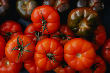 Fresh vegetables at small local urban market. Organic produce on sale at outdoor farmer market. Selling fresh crops and veggies harvest. European urban setting. Close up. Part of the series