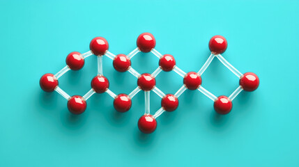 Obraz premium Red atomic structure model on blue background showcasing molecular geometry
