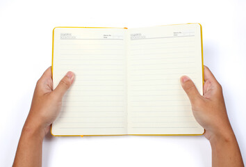 male hand opening notebook on white background.education concept