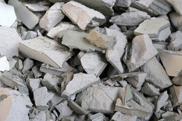 Broken concrete, Piles of lightweight construction bricks after house demolition