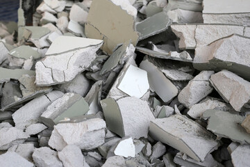 Broken concrete, Piles of lightweight construction bricks after house demolition