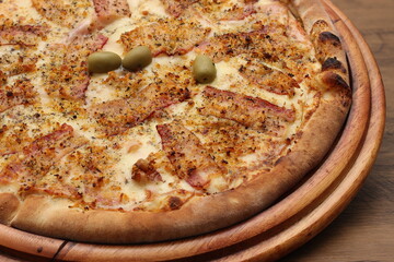 cheese pizza with bacon, fried garlic and olives