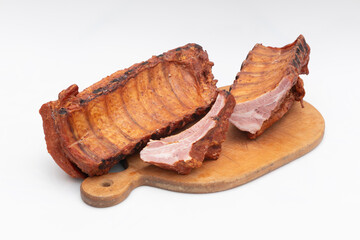 Delicious Smoked Pork Ribs Presented on a Wooden Cutting Board