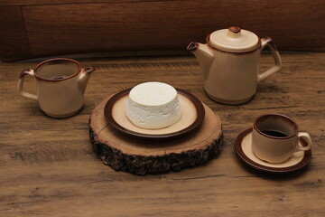 Minas Gerais cheese with coffee on the table