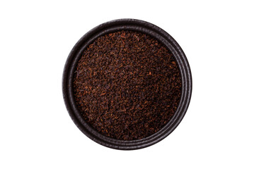 Black tea dry crushed in bowl