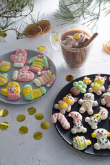 Christmas marshmallows. Winter candy. Sweet food in december. Snowman and Santa Claus