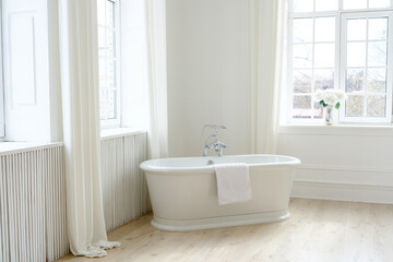 Freestanding White Bathtub in Elegant Interior