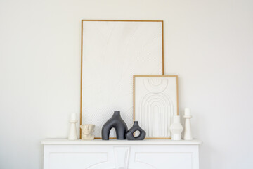 Modern Minimalist Art and Sculptures on White Shelf