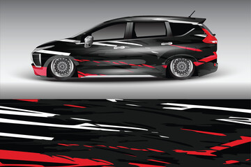 Obraz premium Sleek modified car with dynamic graphic design showcased against a minimalist gradient backdrop