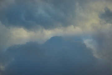 Obraz premium View from inside the cloud, as if a person is floating among the heavenly heights, immersing in an atmosphere of lightness and buoyancy. Symbolizes freedom and independence.