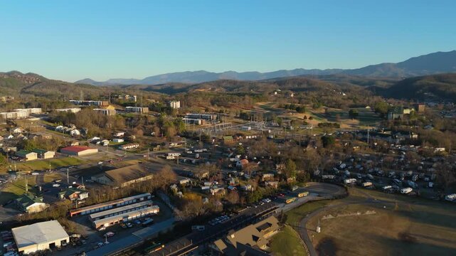 Aerial establishing shot of Piegon Forge, TN at sunset.