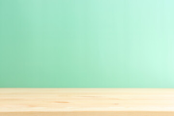 Wooden table and green background. For product display
