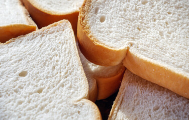 Close-up of freshly sliced ​​soft and fragrant bread with white bread,brown bread crust macro