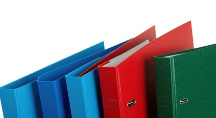 Fototapeta premium Colorful office binders for document organization against white background