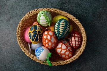 Lost of beautiful Easter eggs in the basket.