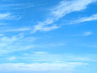 Wispy high-altitude delicate feathery white clouds in the sky
