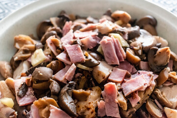 Hot dish of mushroom, ham, turkey and ginger, healthy food