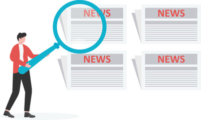 newspaper with magnifying glass

