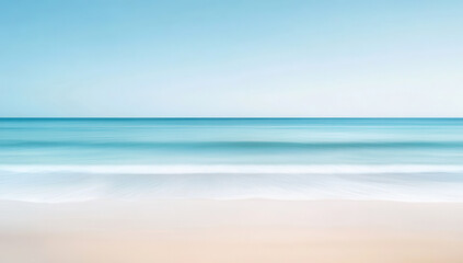 Obraz premium Calm seascape with soft horizon and gentle waves under clear blue sky