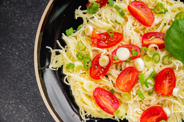 Pasta with tomatoes vermicelli vegetables dish fresh delicious gourmet food background on the table rustic food top view copy space