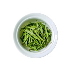 Fresh Green Tea Leaves in a White Ceramic Bowl – Natural Herbal Ingredient