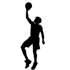 Silhouette of a basketball player performing a lay-up. Perfect for sports illustrations, basketball competitions, and athletic branding