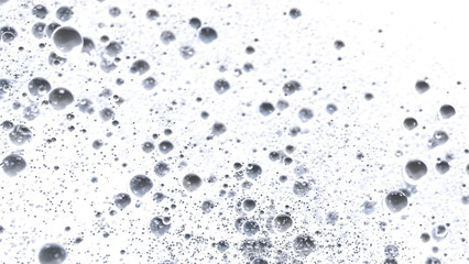 Close-up of many small and large bubbles in a liquid. Perfect for cosmetic or science concepts.