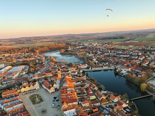 Aerial panorama of historical town Telc with old square and Renaissance castle.