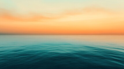 Fototapeta premium A tranquil ocean-inspired gradient where warm orange fades gently into aquamarine, symbolizing calm and vastness