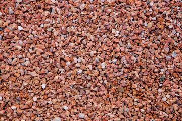 Texture of stone pebbles on the beach. Gravel background. 