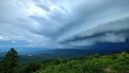Majestic Shelf Cloud Over Mountainous Landscape