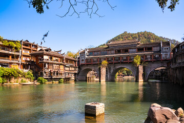 Fenghuang ancient town, China. Traditional chinese wooden houses in old watertown