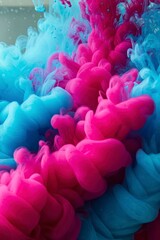 Fototapeta premium Abstract colorful ink explosion, blue and pink tones. Dynamic ink in water effect, ideal for vibrant backgrounds.