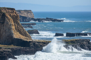 Coastal cliffs along California's Highway 1 in Northern California. Rugged ocean rocks, crashing...