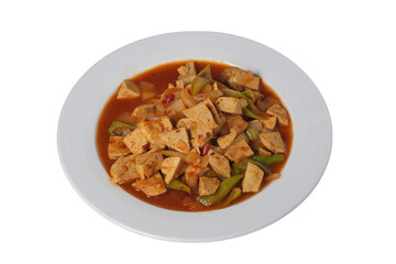 isolated transparent Background. Spicy stir fried tofu with green peppers in savory sauce on white plate