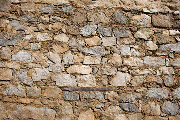 Wall stone of Leh Stok Monastery or Stok Gompa Palace at Leh Ladakh in Jammu and Kashmir, India