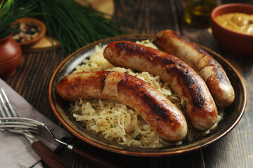 A bowl with Bratwurst and Sauerkraut as side dish - traditional German food