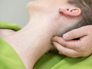Caucasian woman on manual neck and head massage. 